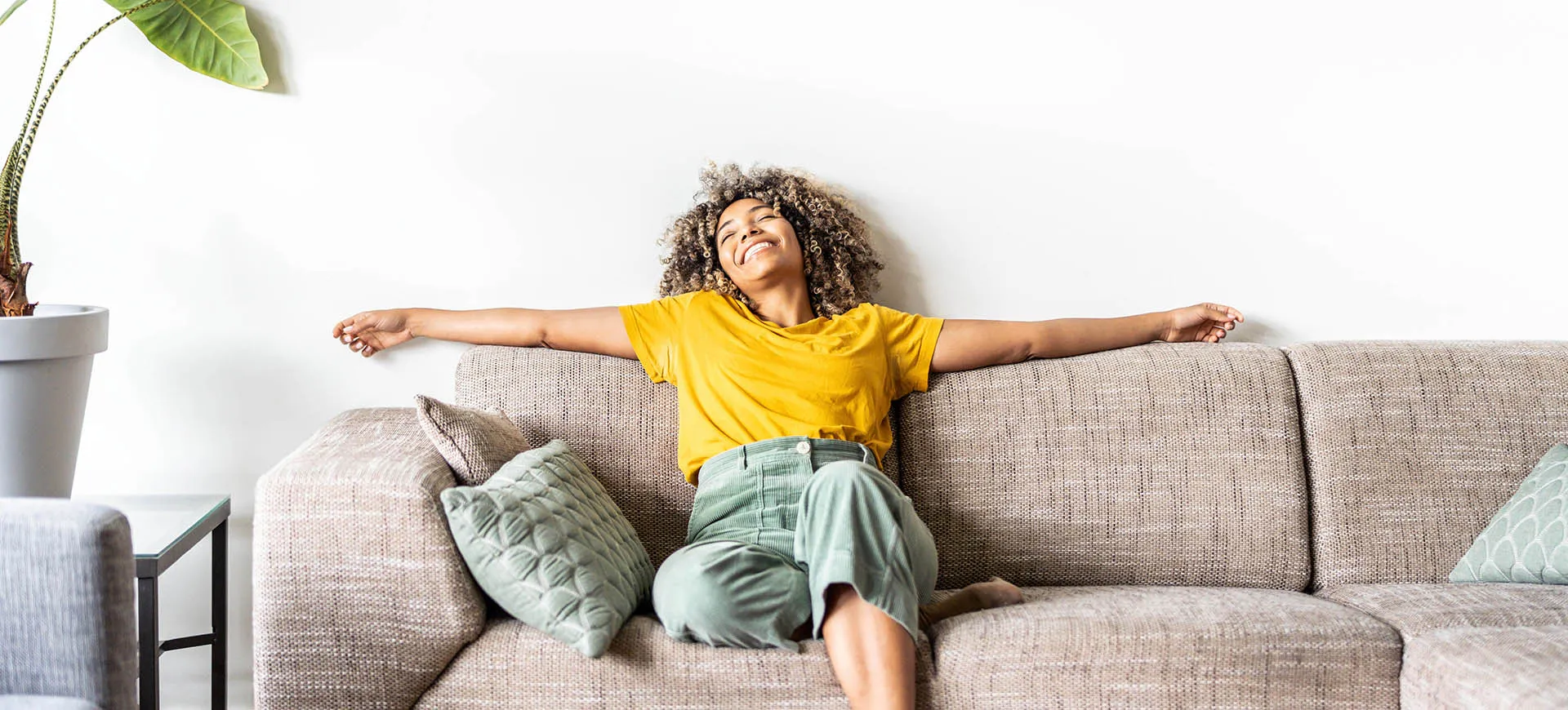 happy woman relaxing on the sofa